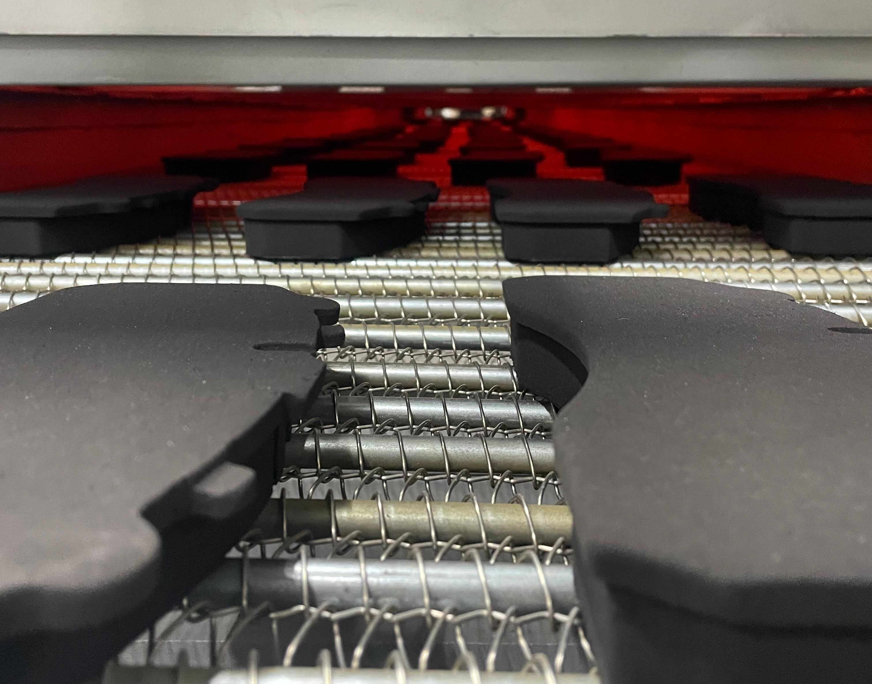 Dust collection and recovery technology for friction material production